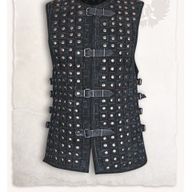 Armadura de Cuero Tachonado +2